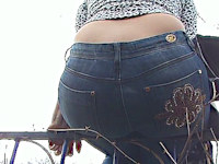 What a cute flower pattern on this chick's jeans, the best spot for this matter - her outstandingly gorgeous ass